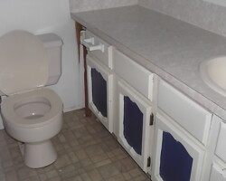 The original bathroom in the separate bedroom